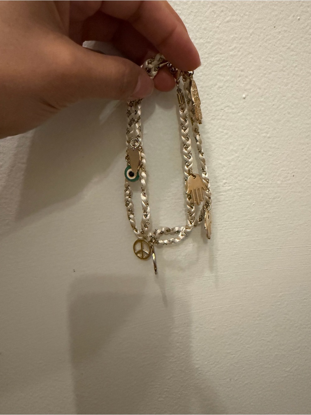Gold and Ivory Braided Charm Necklace with Hamsa & Heart - Picture 2 of 3
